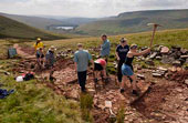 National Trust volunteers relaying a footpath from Cribyn to Pen Y Fan, Brecon Beacons, Mid Wales